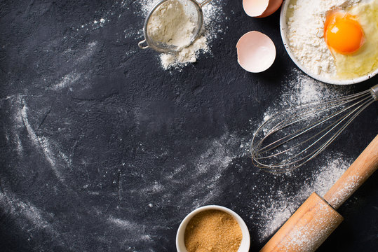 Surface with baking ingredients and utencils